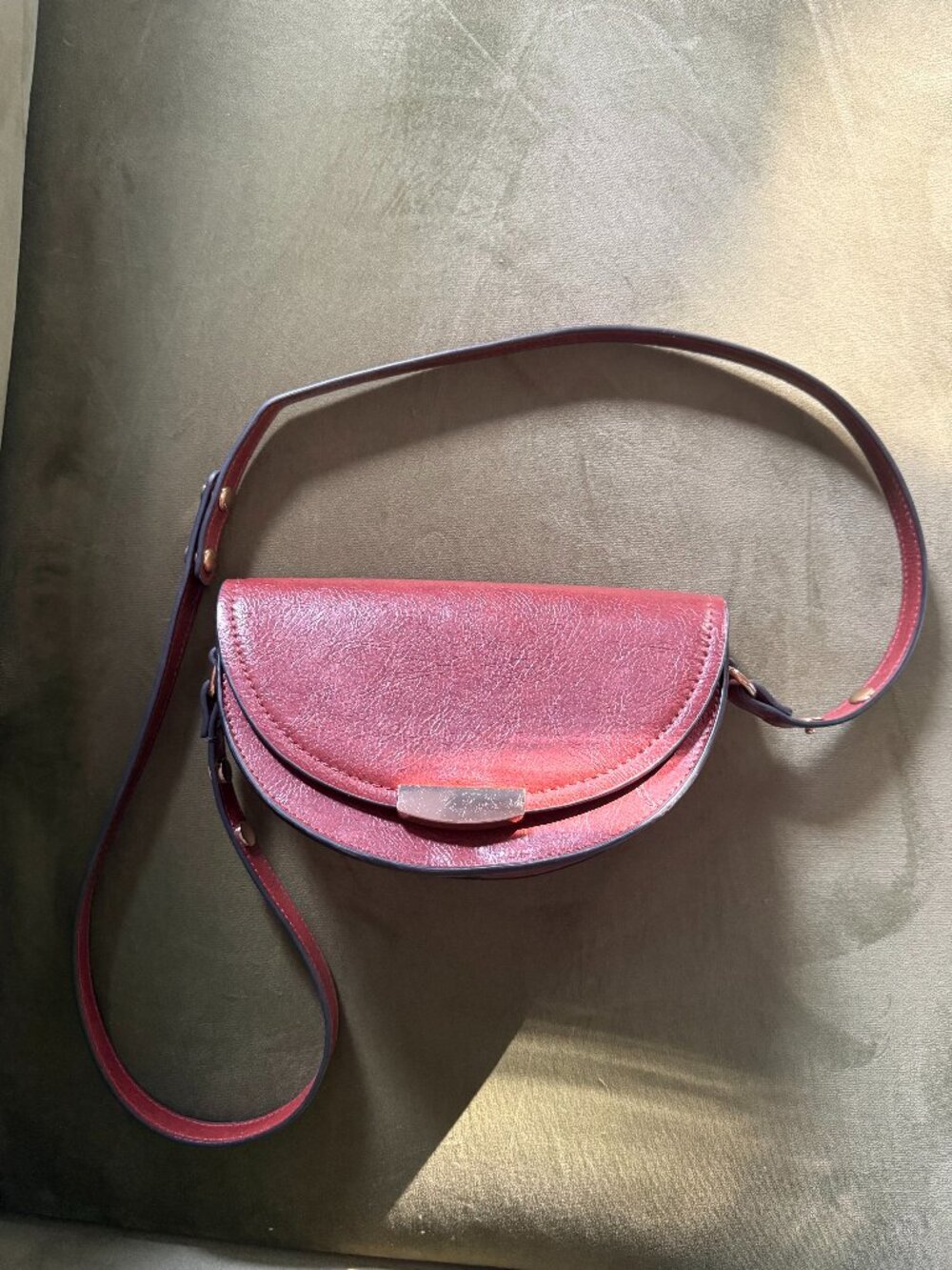 small half-moon crossbody leather bag